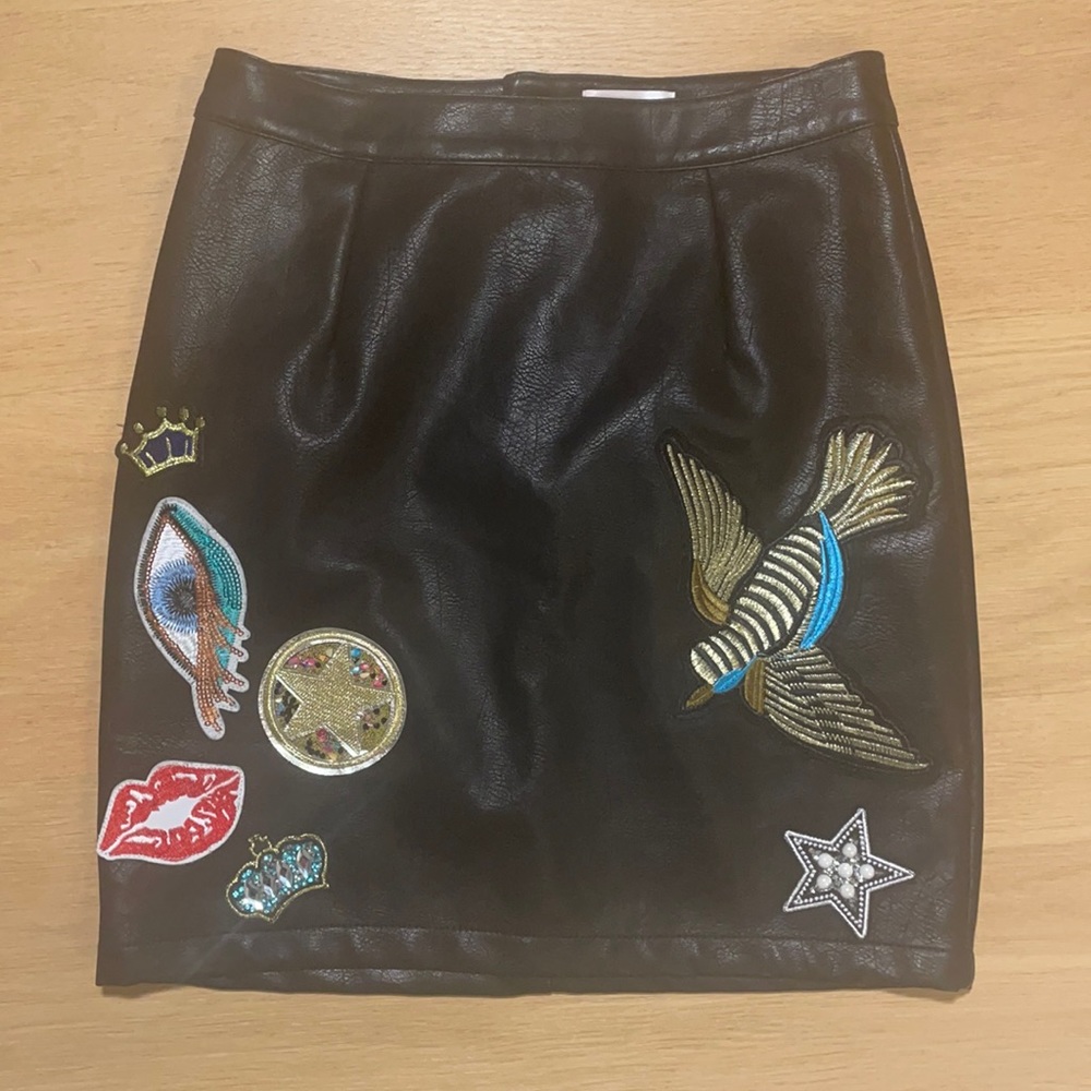 Leather mini skirt with patches!
